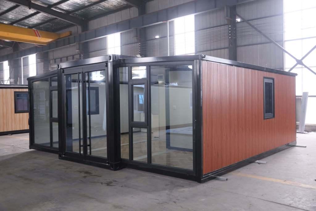 20ft Compac Home by Portable Dwellings featuring glass walls
