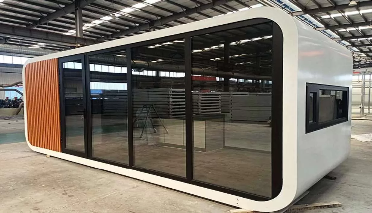 Modern pre fabricated home in NZ with a sleek design, large glass windows, and a compact, space-efficient layout